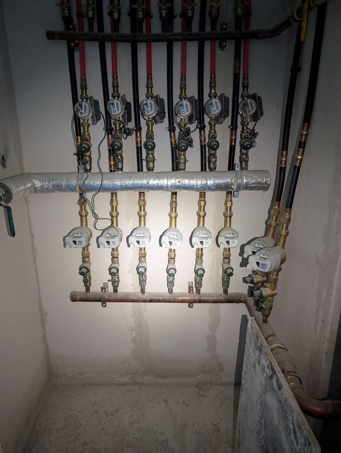Water meter and valve manifold assembly