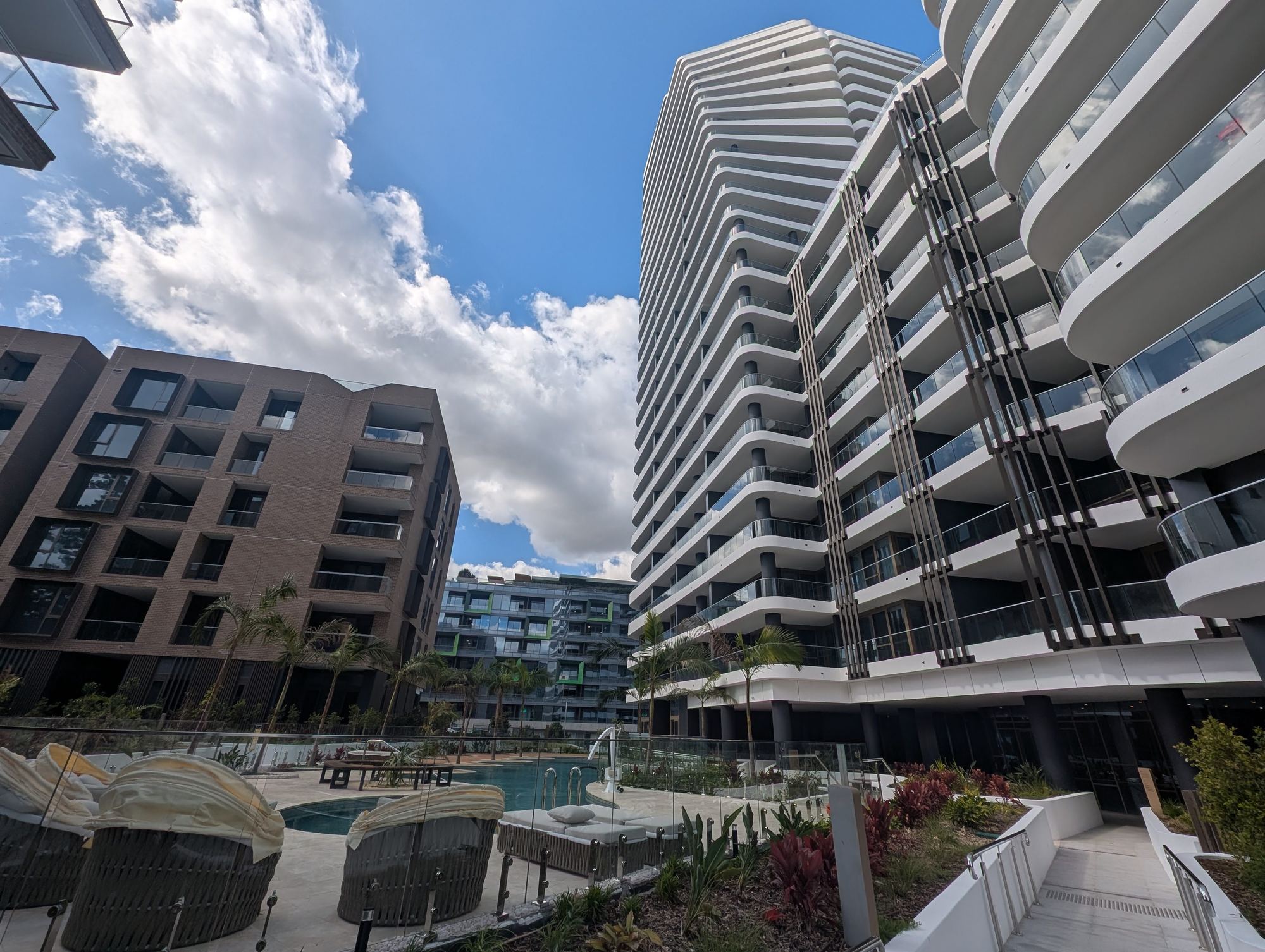 Infinity Park apartment towers and landscaped podium in Norwest, hydraulic services by Prime