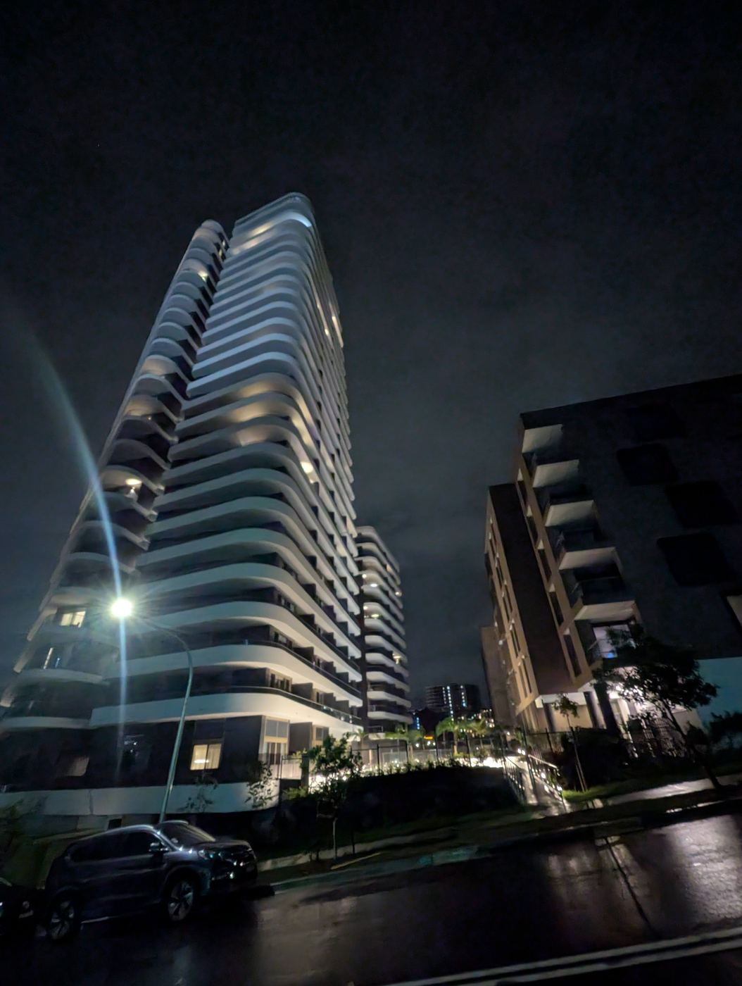 Infinity Park towers lit up at night, Norwest